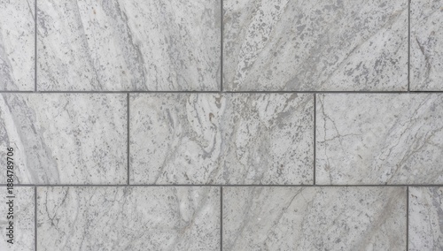 Gray Concrete Tiles Arranged in a Pattern on a Surface in Daylight