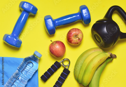 Schilderij op canvas Activity and good nutrition, represented by sports accessories and fruit