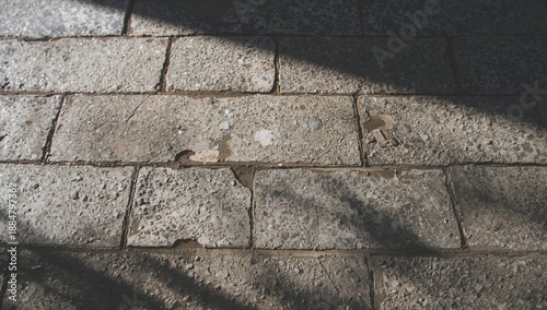 Concrete Pavement With Texture and Shadow Patterns in Outdoor Setting