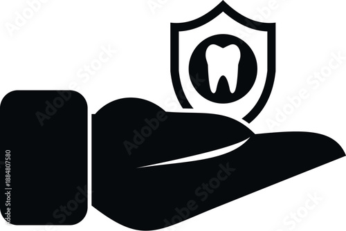 Hand presenting a dental shield protecting an oral tooth, symbolizing health