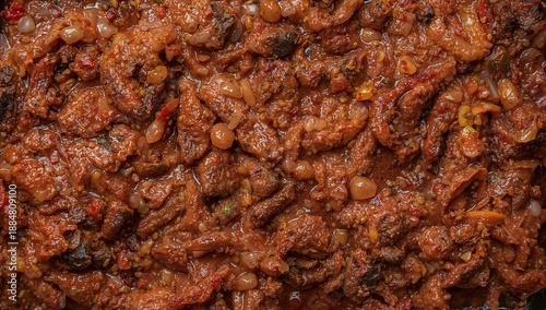 Cooked Meat in Sauce With Spices is Served in a Metal Container