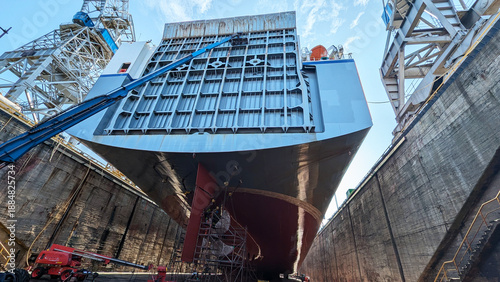 Fotografia Large Cargo Vessel Hull Maintenance and Repair Inside Industrial Dry Dock