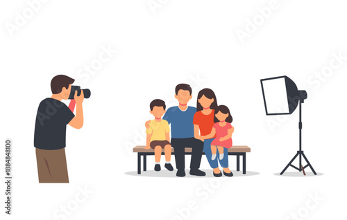 Family photo session with photographer and lighting equipment