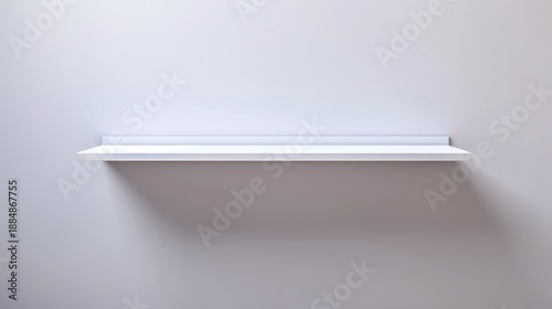 A photo of a simple white bookshelf against a plain wall.