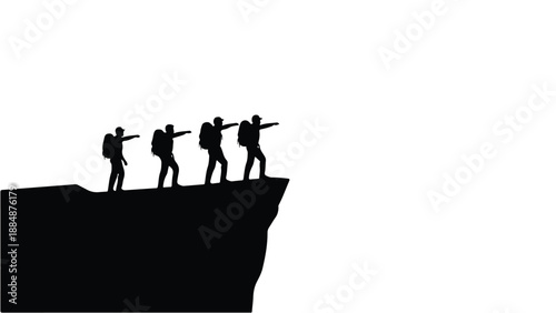 Group of hikers standing on a cliff silhouette