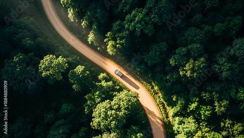 Road Trip Adventure: Aerial Image of Car on Forest Road, Scenic Route Photography, Nature Travel, Summer Vacation, Outdoor Exploration, Journey