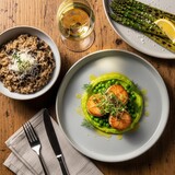 Elegant Scallop Dinner with Risotto and Asparagus - A Culinary Delight.