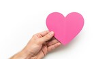 Male hand holding large pink blank paper heart isolated on white background. Mockup for Valentine day message or greeting card