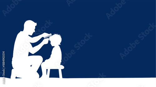 Father cutting son's hair at home with clippers.