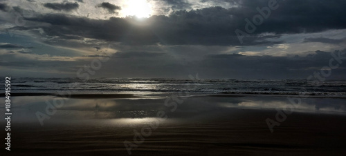 Brazil coast at sunset. Dramatic sky, dark clouds. 
