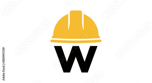 Construction and safety concept with yellow hard hat and letter W.