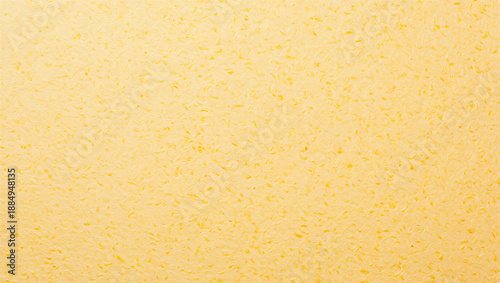 Fotografia Vibrant yellow textured background with subtle speckles