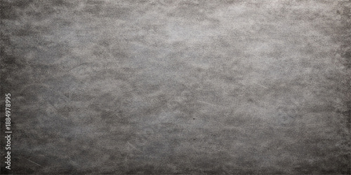 A dark vintage grunge paper texture with an aged rough surface and black and white grey concrete wall pattern for a textured stone backdrop design