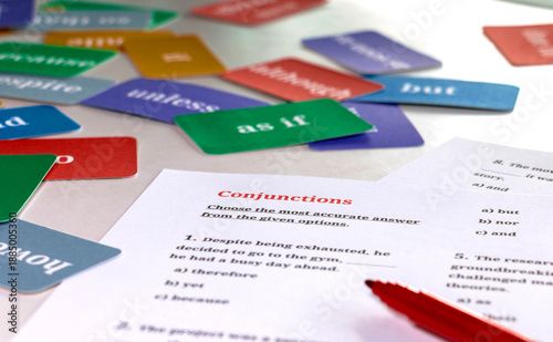 English grammar exam practice sheet and colorful flashcards