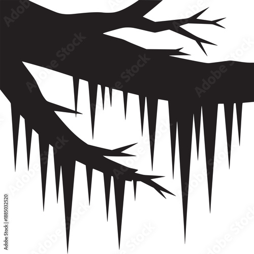 Silhouette of tree branches with icicles hanging down against a white background in winter season