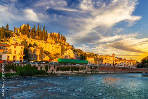 Tableau sur toile Golden hour sunset from the Adige River Ponte Pietra stone bridge looking towards Castel San Pietro in the historic city of Verona, Italy