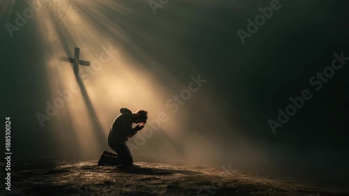 Kneeling man praying dramatic sunlight with cross shadow and golden light, solitude and devotion misty forest, kneeling person bathed golden light with cross shaped shadow conveying spiritual