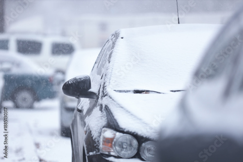 Modern car covered with sno...