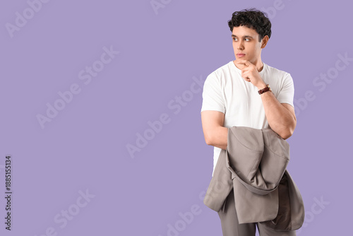 Thoughtful young man with s...