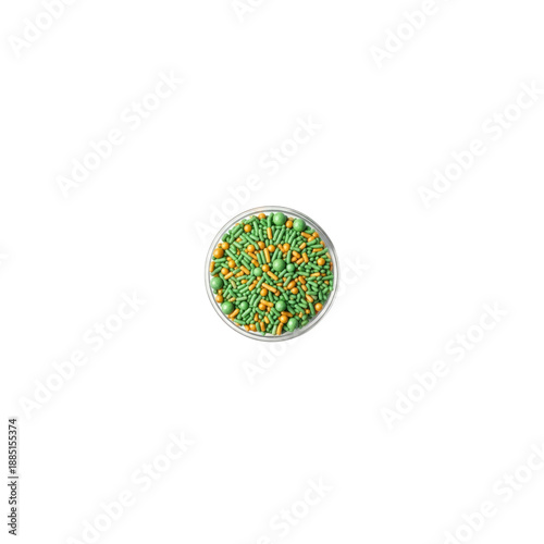 Green and orange sprinkles in bowl