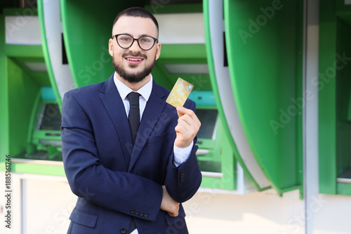 Young businessman with cred...