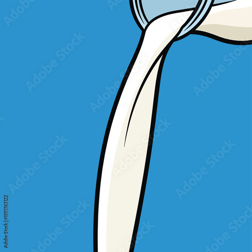 A creamy liquid pouring from a bottle