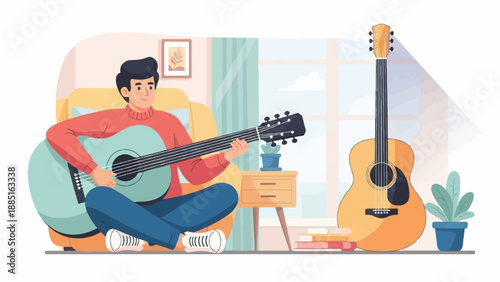 A person plays guitar while another guitar stands nearby
