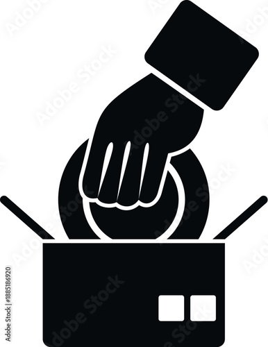 Hand placing a plate into a box, symbolizing donation, charity, and food assistance