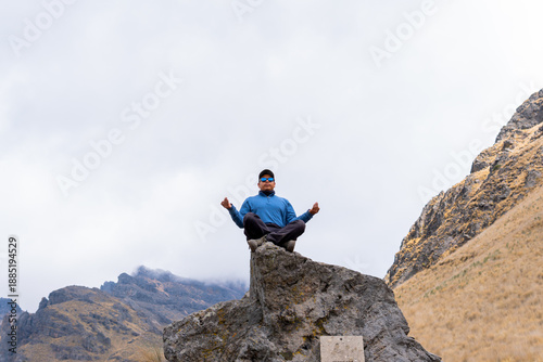 Photography Man meditating on rock conquering iztaccihuatl volcano peak