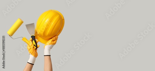 Hands with hardhat and cons...
