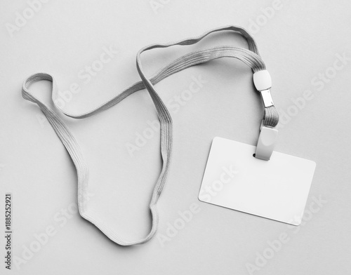 Blank white Id card with lanyard. Blank plastic badge and lanyard mockup. Space for text. Flat lay.