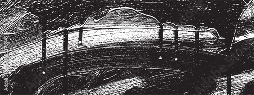 Closeup of a Roller Coaster Track with Supports and Lights.