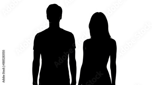 Silhouette of a man and woman standing together.