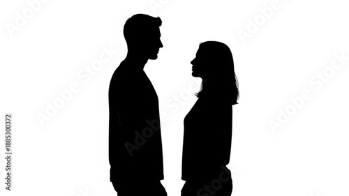 Silhouette of a man and woman facing each other.