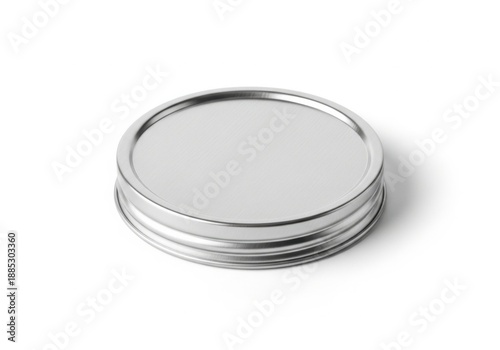 A shiny silver tin container with a lid on a white surface