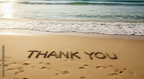 Coastal Gratitude: Thank You etched in the sand, framed by the rhythmic dance of ocean waves and the footprints of journey's taken, a serene ode to appreciation. 