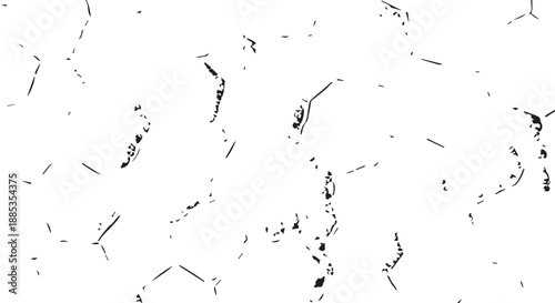 Abstract monochrome texture featuring random scratches and fragments forming a high-contrast background.