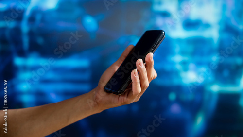 Wallpaper Mural Close up of hand holding smartphone against futuristic digital background, representing mobile technology, data driven business strategy, fintech services, cloud solutions, cybersecurity systems Torontodigital.ca