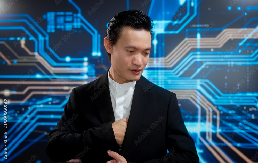 Fototapeta premium Stylish businessman adjusting his formal suit in front of glowing digital circuit background, representing confidence, modern leadership, advanced technology, strategic thinking, professional success