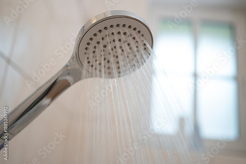 Water Conservation Concept with Running Shower and Rising Utility Costs