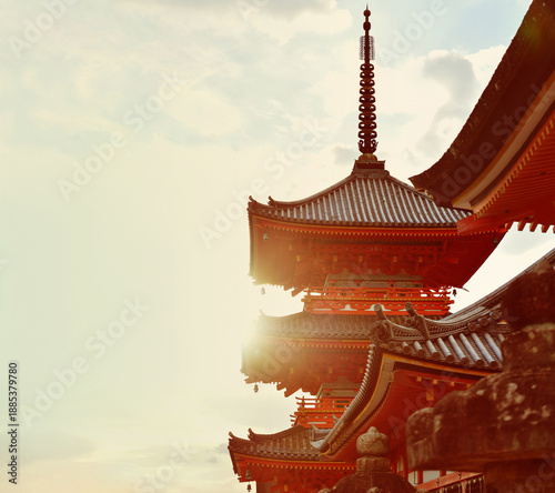 Three storied pagoda in the Kiyomizu-dera temple at sunset. Kyoto, Japan