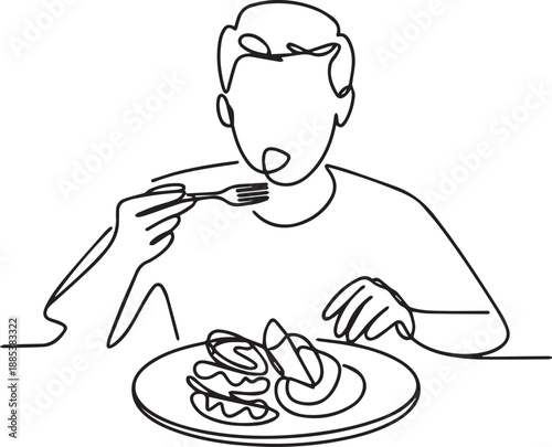 Man eating breakfast alone at a table with a fork