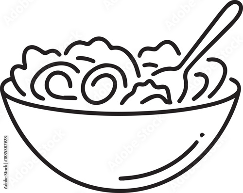 A spoon stirs oatmeal in a bowl from a high angle view