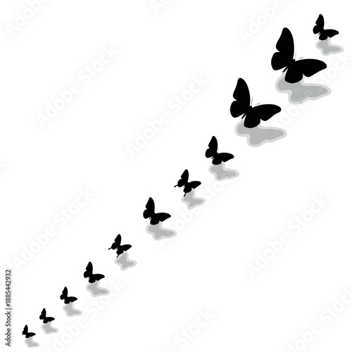 A flock of black butterflies flying in a diagonal line with shadows on a white background.