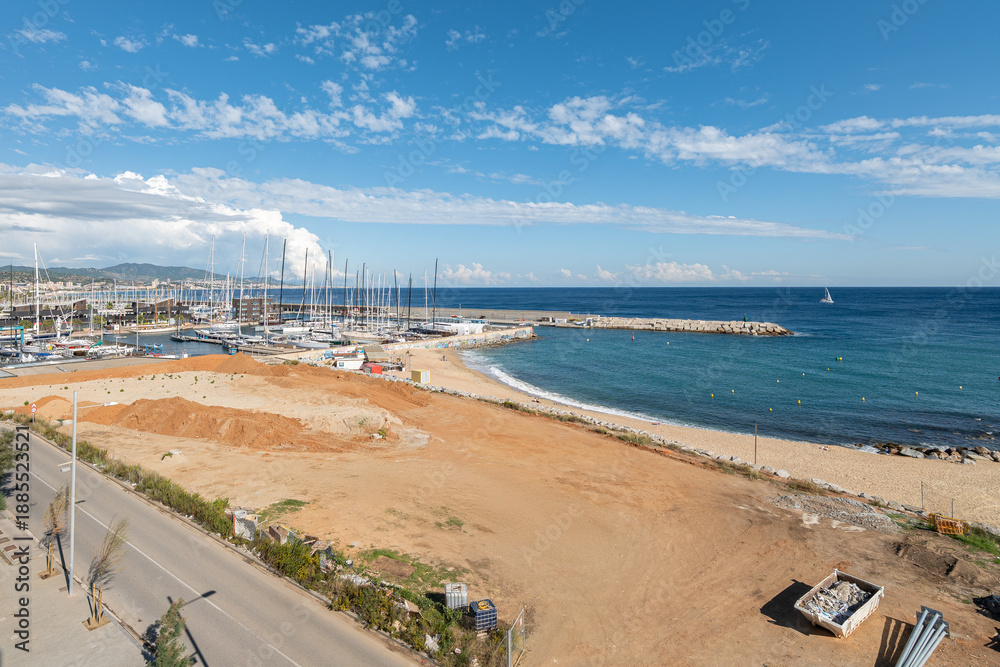 custom made wallpaper toronto digitalBeachfront area cleared with sand and dirt in Badalona, prepared for future construction near marina and coastline