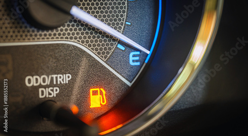 Low Fuel Warning Light on car Dashboard Display