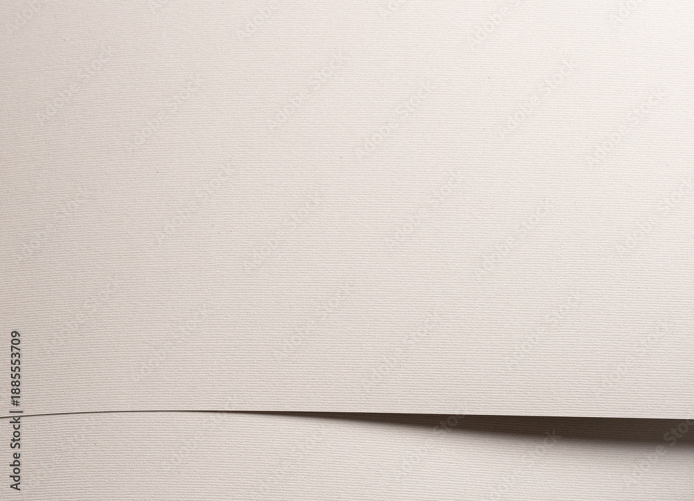 Fototapeta premium Warm white textured paper background with horizontal edge and calm geometry. Matte surface with