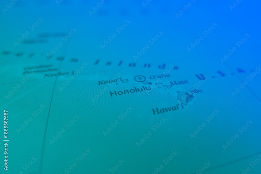 Obraz premium Map of Honolulu in green and blue colors. Selective focus on label, close-up view