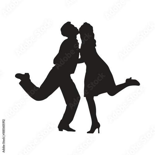 Couple in silhouette kissing and embracing romantically