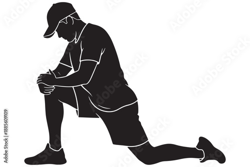 A man in a kneeling position, stretching his leg and preparing for a workout or exercise routine.